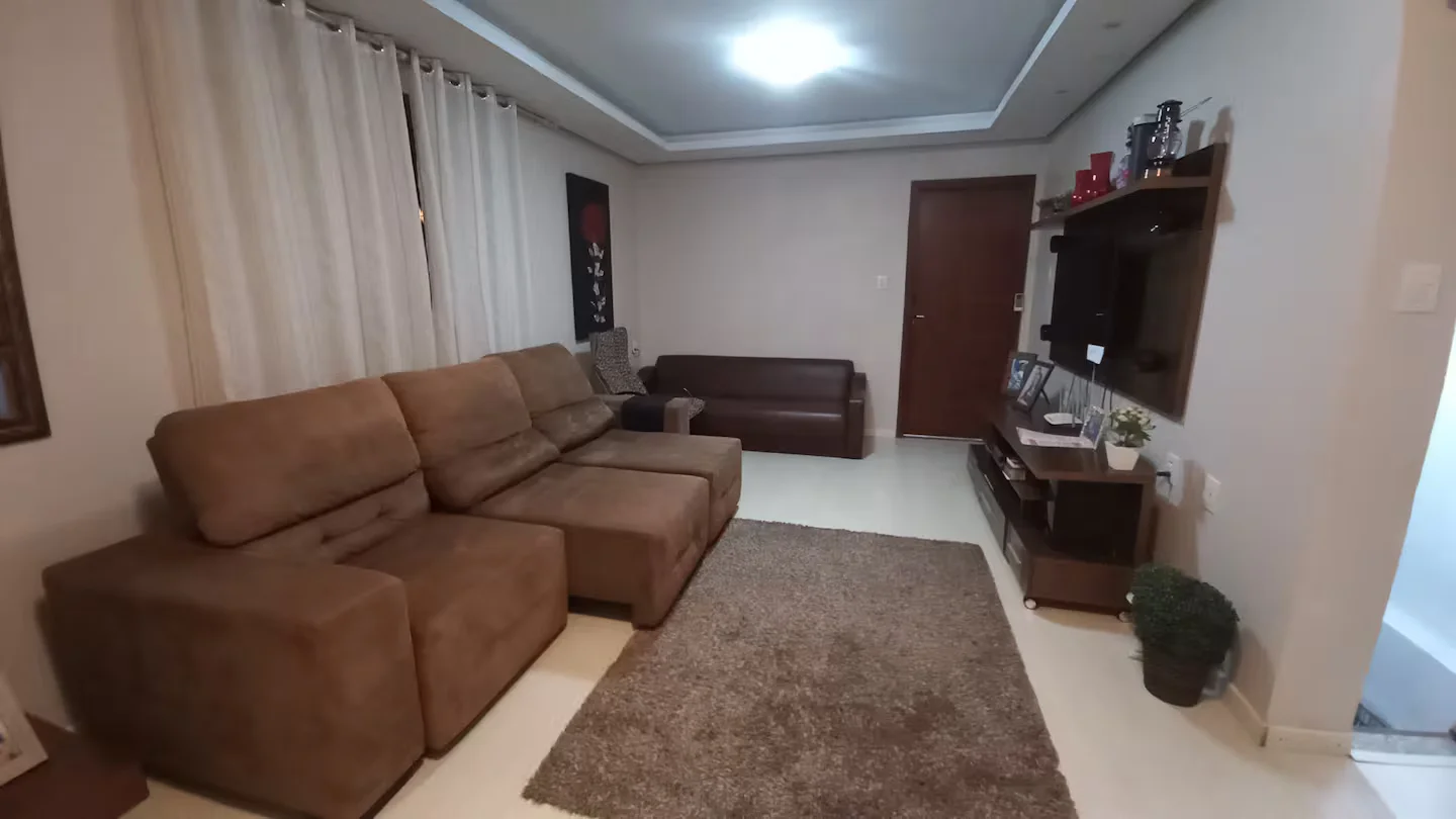 Sala de estar aconchegante da Estadia da Tranquilidade