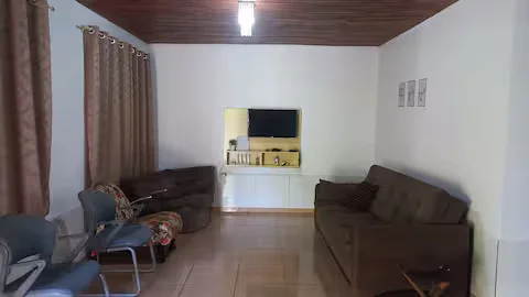 Sala de estar com sofá-cama